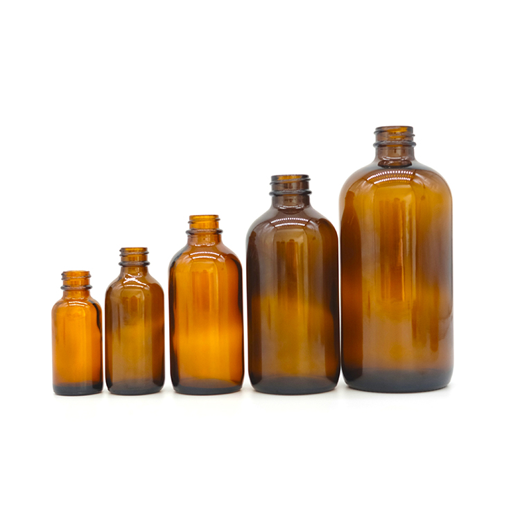 Amber Glass Round Bottle With Black poly cone plastic cap